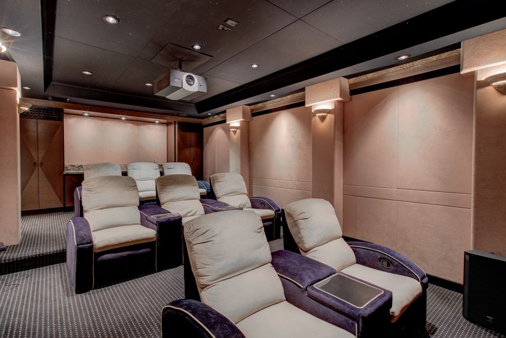 Photo of a mediterranean home cinema in Miami with feature lighting.