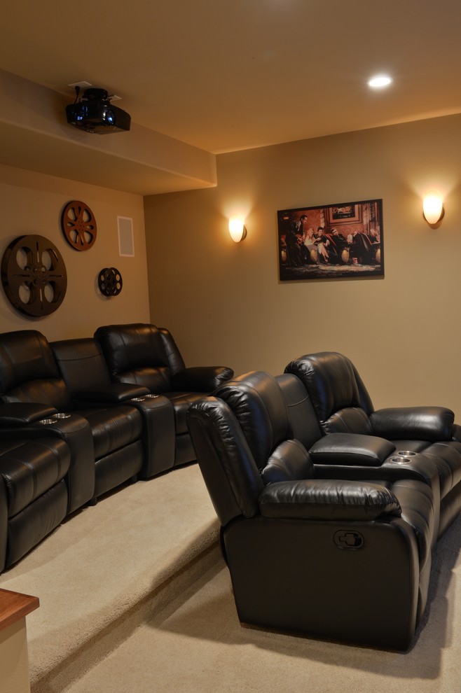 Inspiration for a craftsman carpeted home theater remodel in Milwaukee