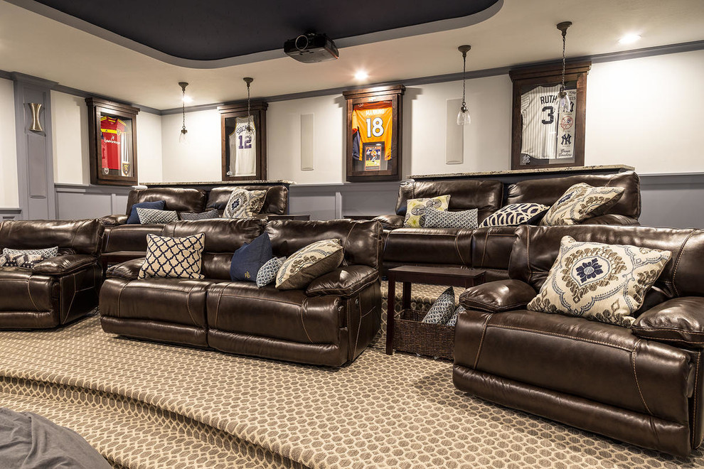 Home theater - huge craftsman enclosed carpeted home theater idea in Salt Lake City with gray walls and a projector screen
