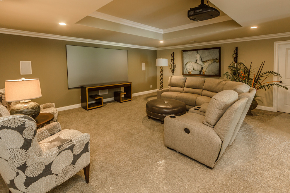 Home theater - mid-sized transitional open concept carpeted home theater idea in Louisville with beige walls and a media wall