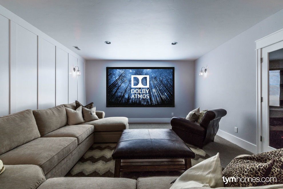 Photo of a small enclosed home theatre in Salt Lake City with white walls, carpet and a projector screen.