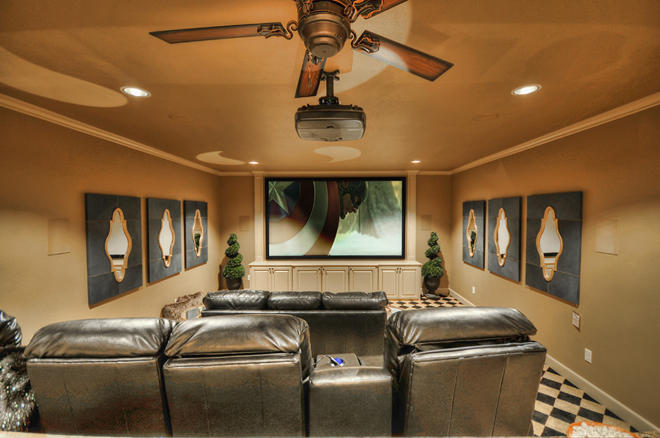 Home theater - large traditional enclosed porcelain tile and multicolored floor home theater idea with brown walls and a projector screen