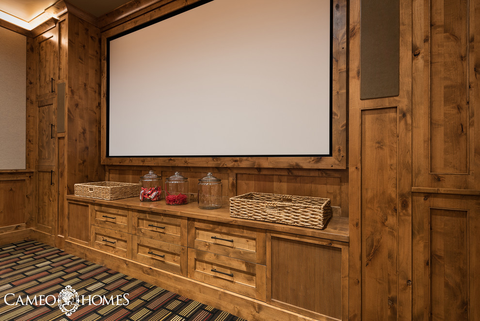 Design ideas for a large rustic enclosed home cinema in Salt Lake City with carpet, white walls and a projector screen.