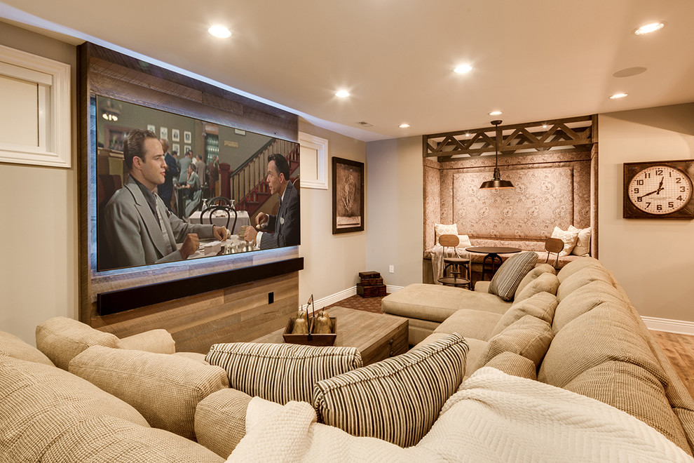 Huge mountain style open concept carpeted home theater photo in Baltimore with beige walls and a projector screen
