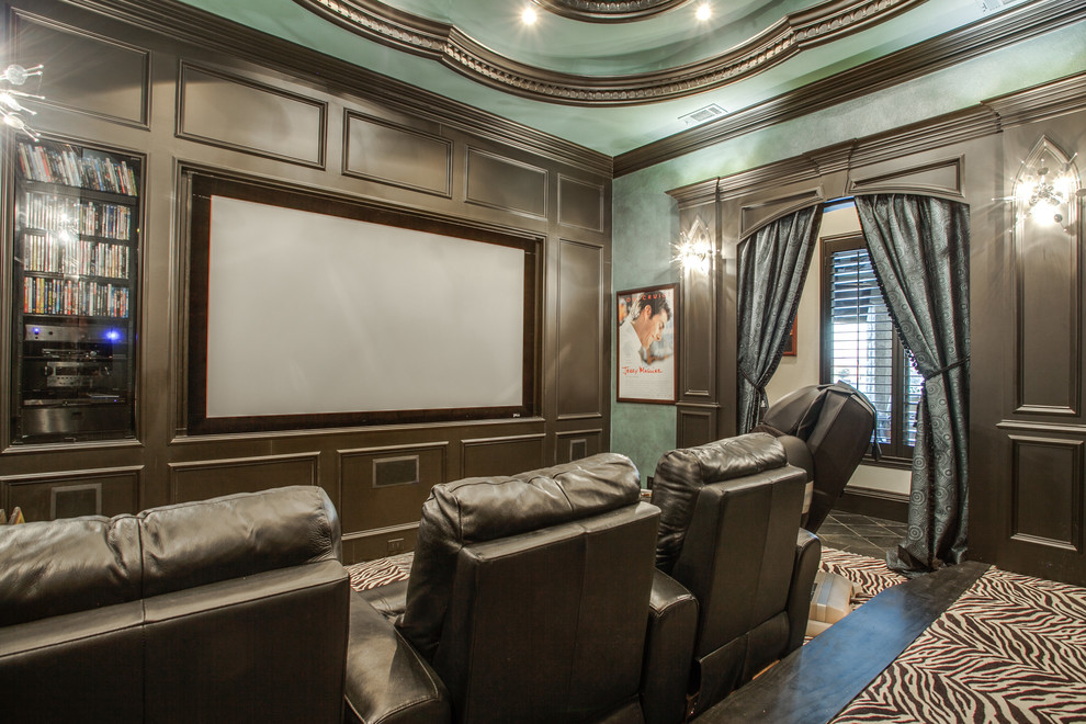 Photo of a medium sized traditional enclosed home cinema in Dallas with blue walls, carpet and a projector screen.