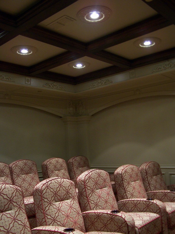 Home theater - traditional home theater idea in Houston