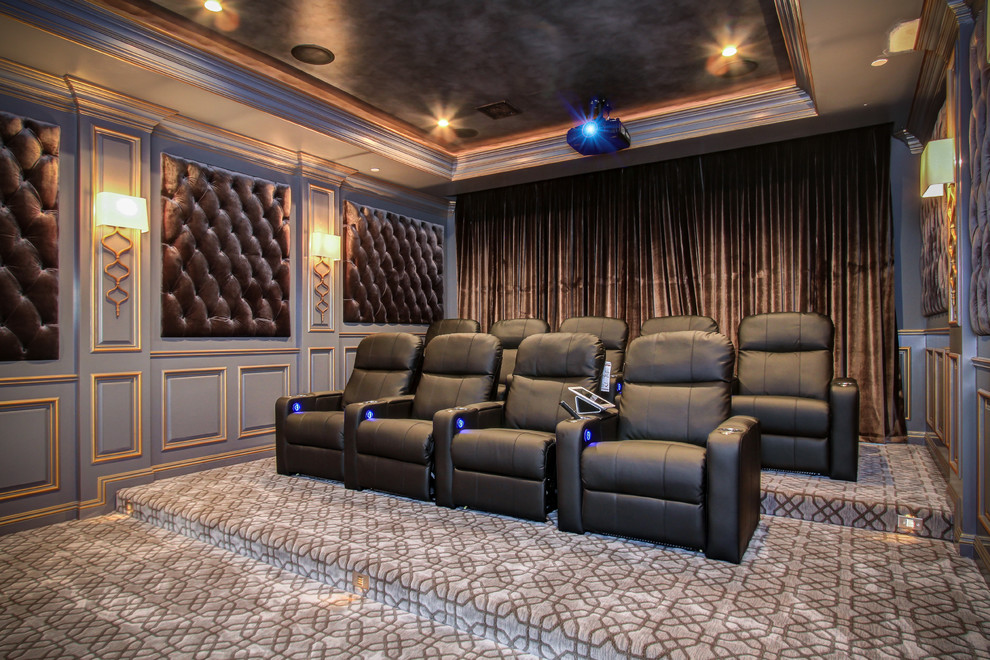 Photo of a medium sized classic enclosed home cinema in Los Angeles with grey walls, carpet and a projector screen.