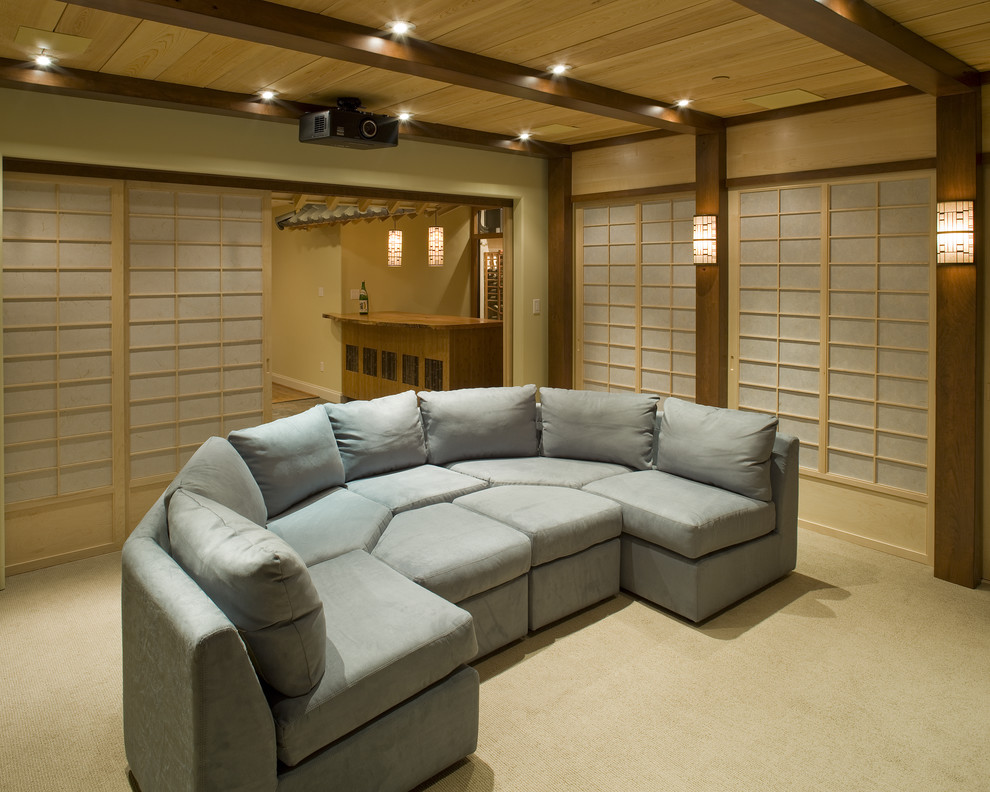 Example of an asian home theater design in Philadelphia with a projector screen