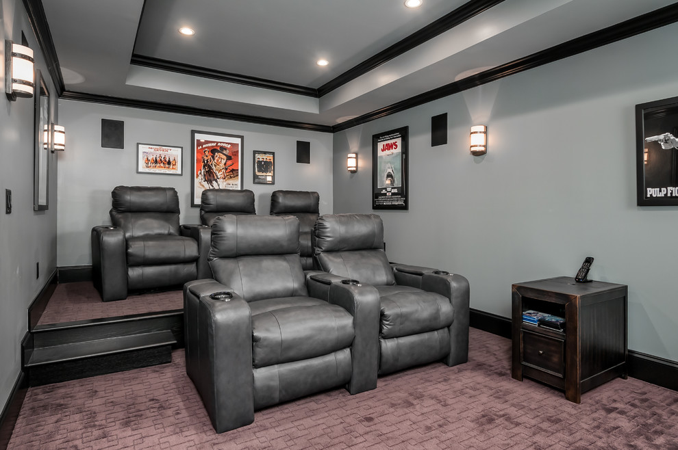 Large traditional enclosed home cinema in Atlanta with grey walls, carpet, a wall mounted tv and brown floors.