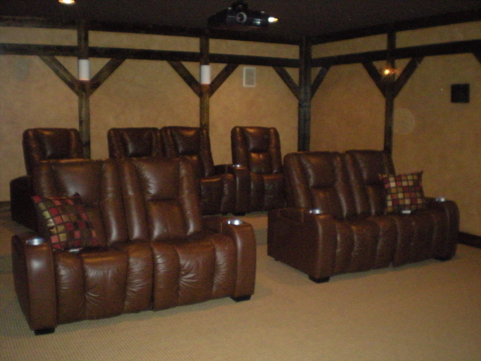 This is an example of a contemporary home cinema in Baltimore.