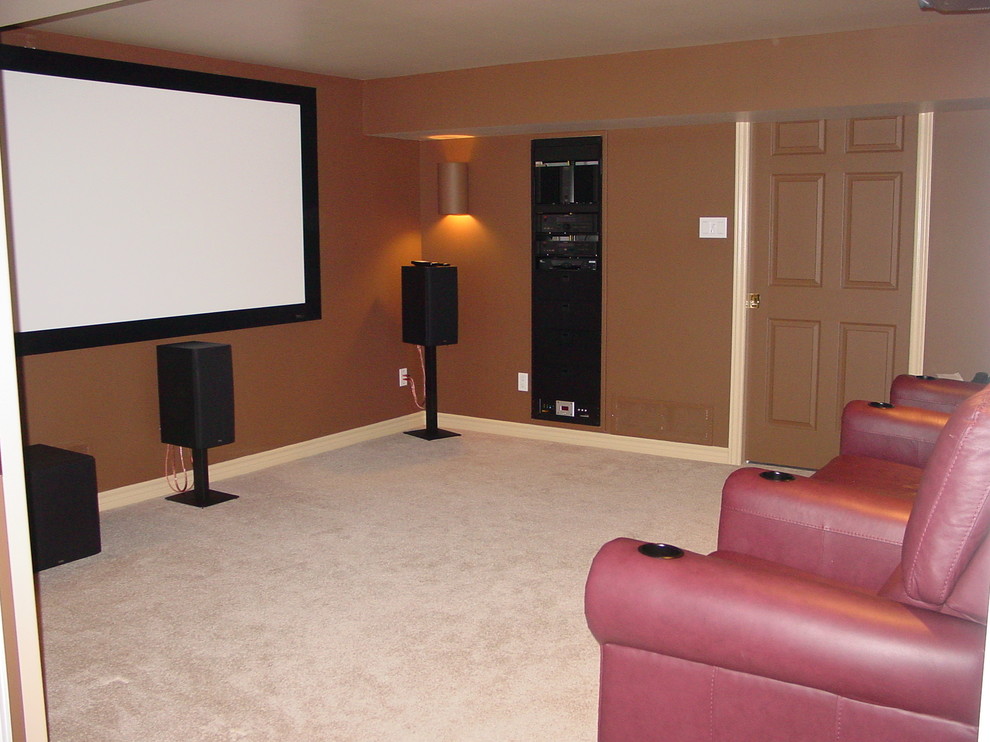 Example of a trendy home theater design in Toronto