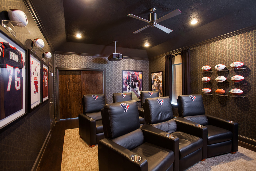 Home theater - traditional home theater idea in Houston with gray walls