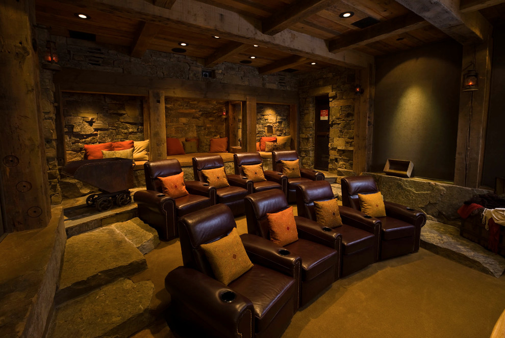 Inspiration for a rustic home theater remodel in Other