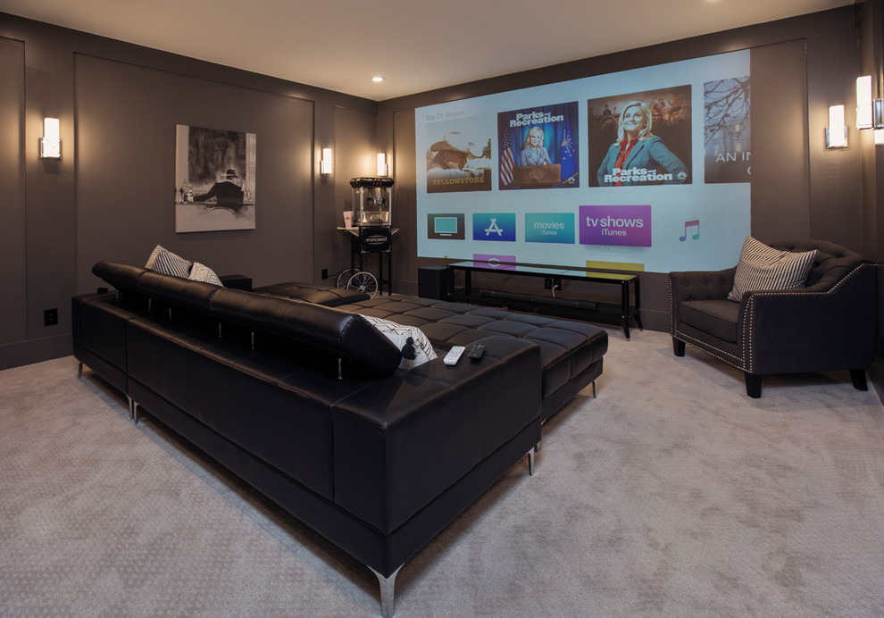 This is an example of a large contemporary enclosed home cinema in Louisville with grey walls, carpet, a projector screen and grey floors.