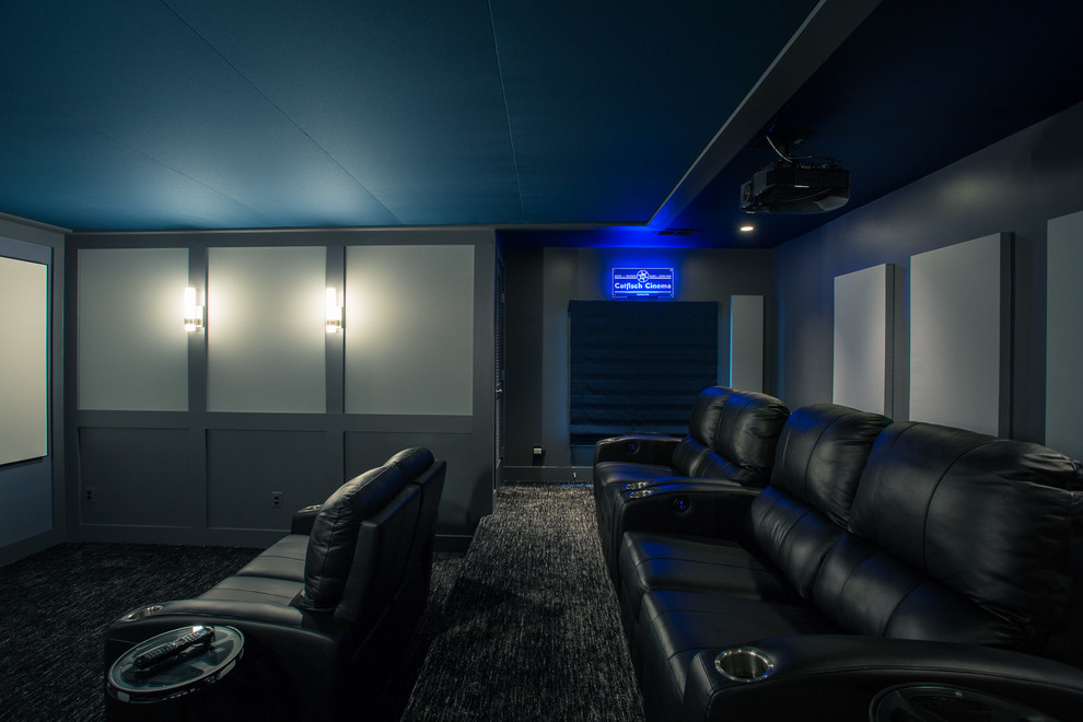 Inspiration for a large contemporary enclosed carpeted and blue floor home theater remodel in DC Metro with gray walls and a projector screen