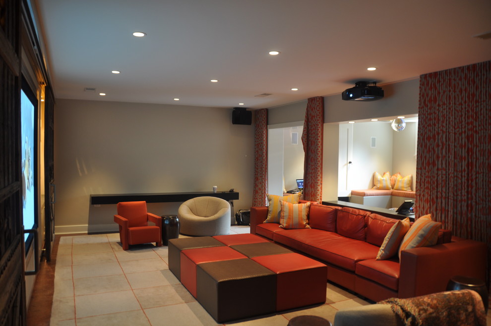 Design ideas for a large contemporary enclosed home cinema in Chicago with beige walls, a projector screen and concrete flooring.