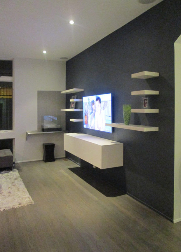 This is an example of a contemporary home cinema in Chicago.