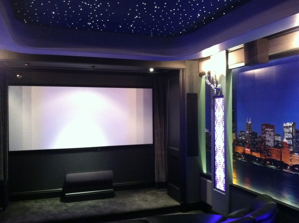Design ideas for a contemporary enclosed home cinema in Chicago with blue walls and carpet.