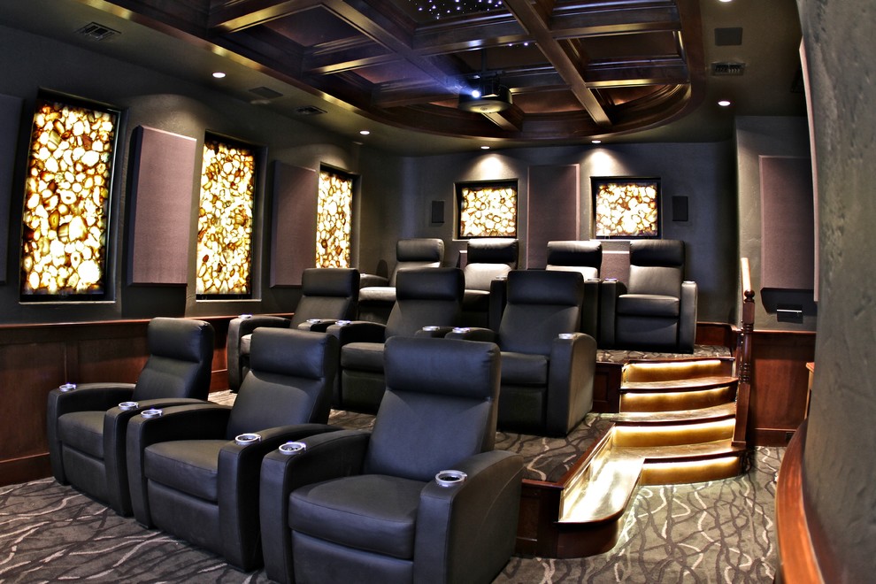 This is an example of a mediterranean home cinema in Austin.