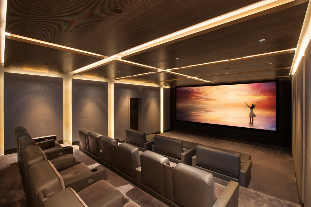 Home theater - large contemporary enclosed carpeted and brown floor home theater idea in Los Angeles with brown walls and a projector screen