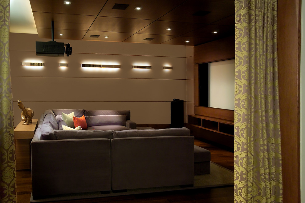 Photo of a contemporary home cinema in Toronto.