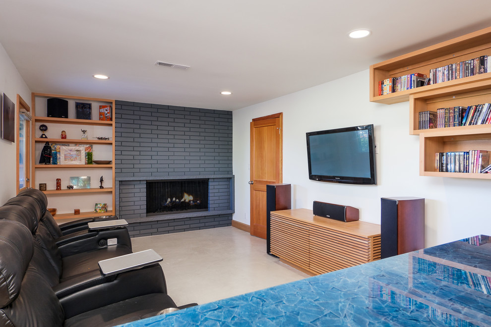 Example of a trendy home theater design in Seattle