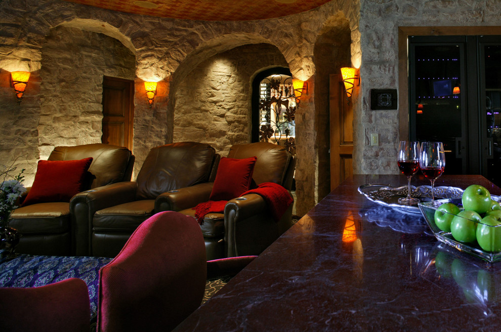 Example of a tuscan home theater design in Austin