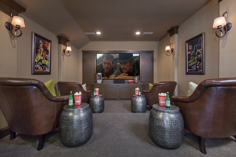 This is an example of a traditional enclosed home cinema in Houston with brown walls, carpet, a built-in media unit and grey floors.