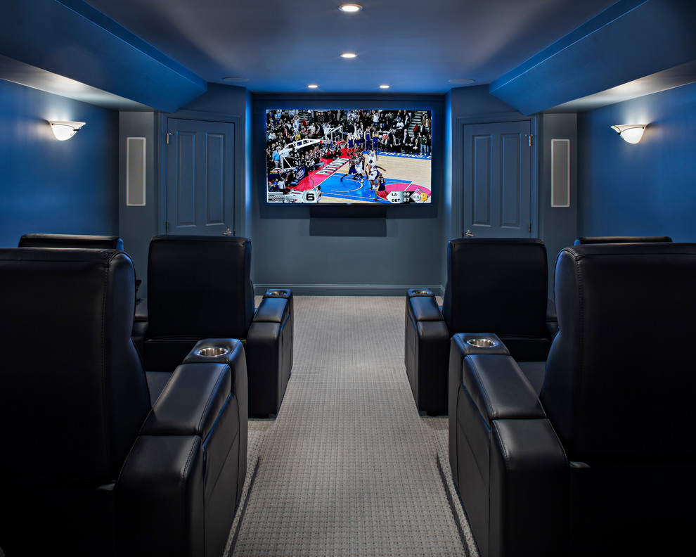 This is an example of a large classic home cinema in New York with beige walls, laminate floors and grey floors.