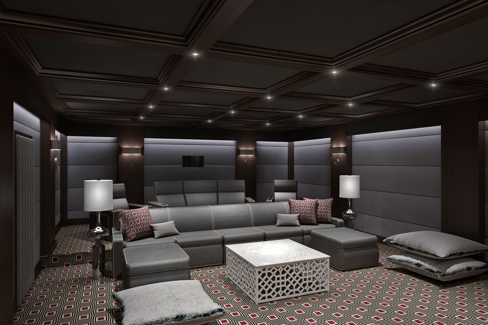 Cette image montre une grande salle de cinéma design fermée avec un mur gris, moquette, un écran de projection et un sol multicolore.
