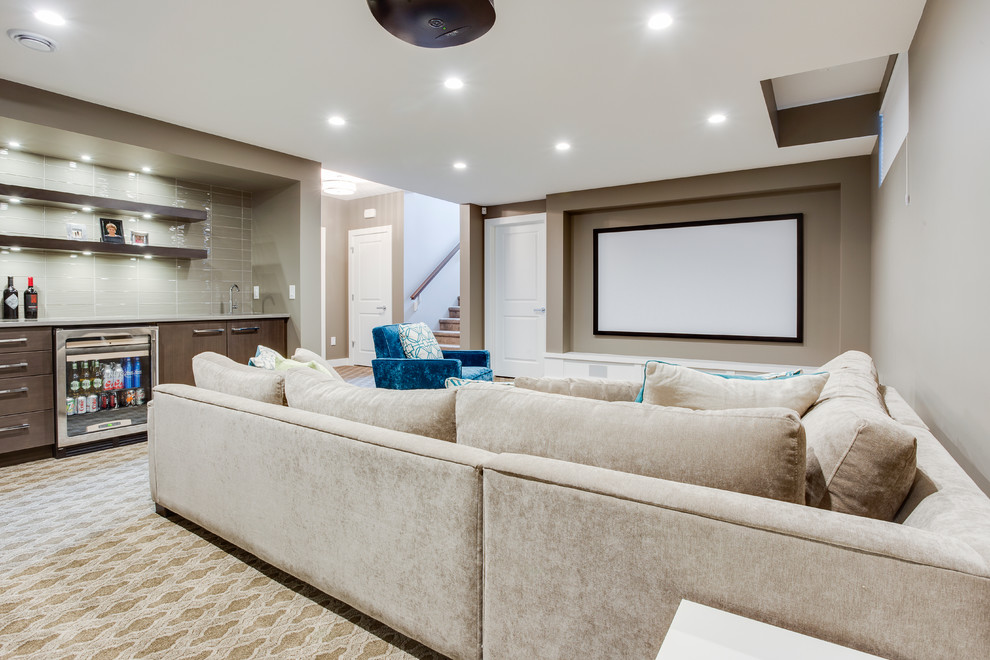 Transitional carpeted home theater photo in Other with beige walls and a projector screen