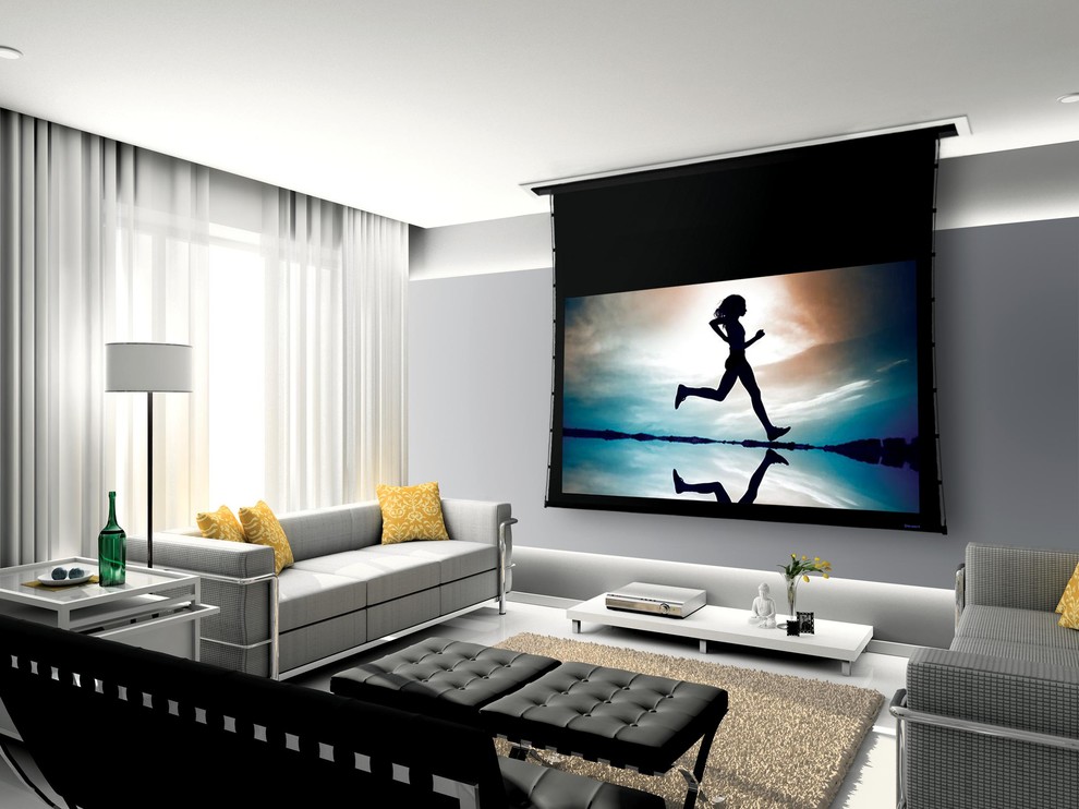 Modelo de cine en casa cerrado moderno de tamaño medio con paredes grises y pantalla de proyección