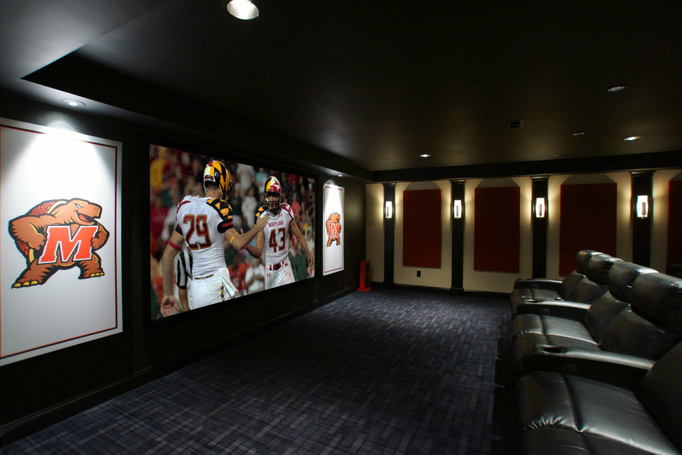 Large elegant open concept carpeted home theater photo in Baltimore with black walls and a projector screen