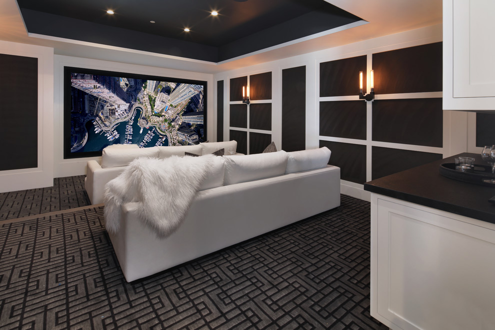 Источник вдохновения для домашнего уюта: изолированный домашний кинотеатр в стиле неоклассика (современная классика) с черными стенами, ковровым покрытием и серым полом