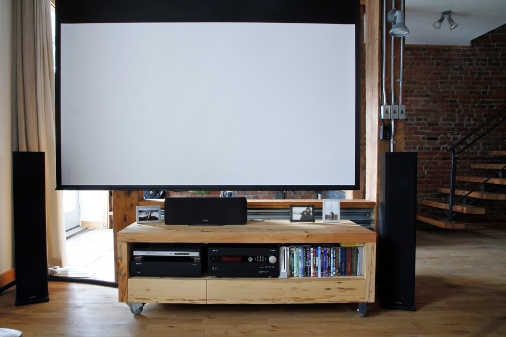 Inspiration for an industrial home theater remodel in Montreal