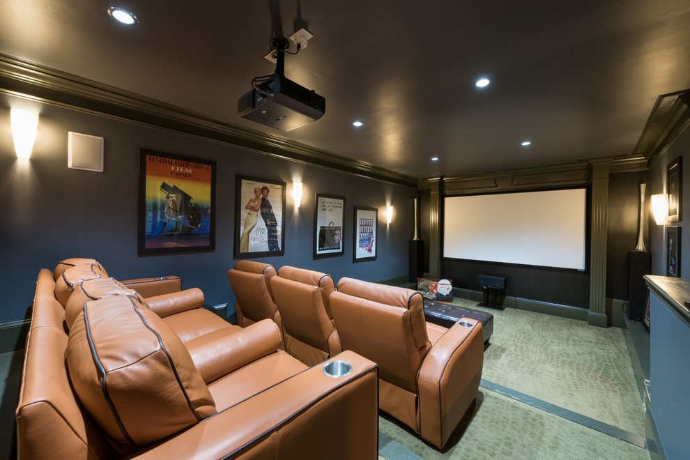 Inspiration for a transitional enclosed green floor home theater remodel in Atlanta with gray walls and a projector screen