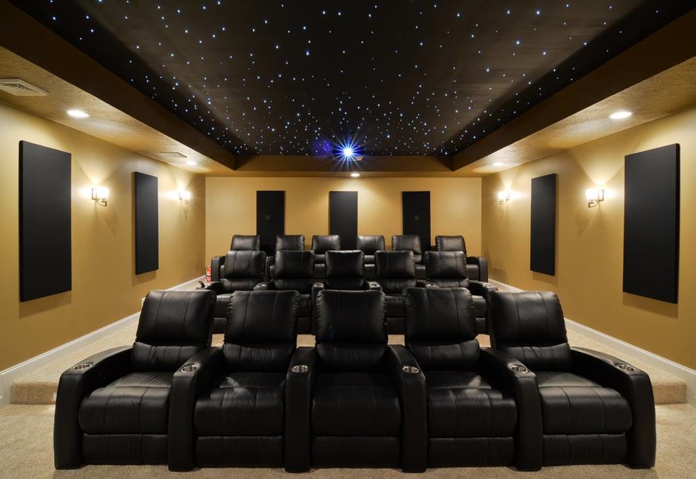 Home theater - modern enclosed home theater idea in Cleveland with a projector screen