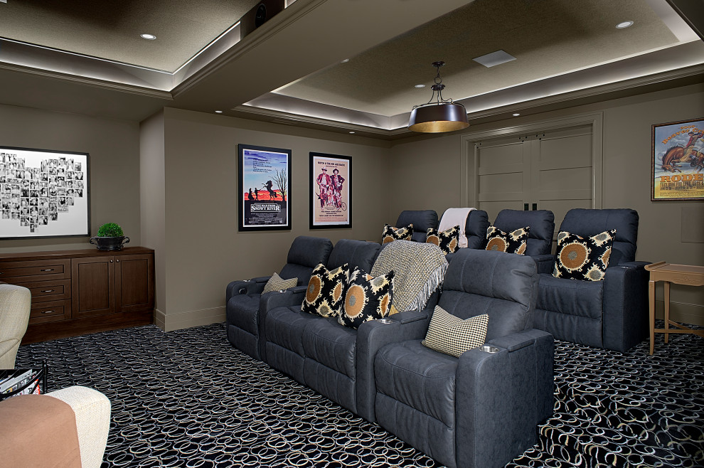Home theater - large transitional enclosed carpeted and multicolored floor home theater idea in Grand Rapids with brown walls and a projector screen