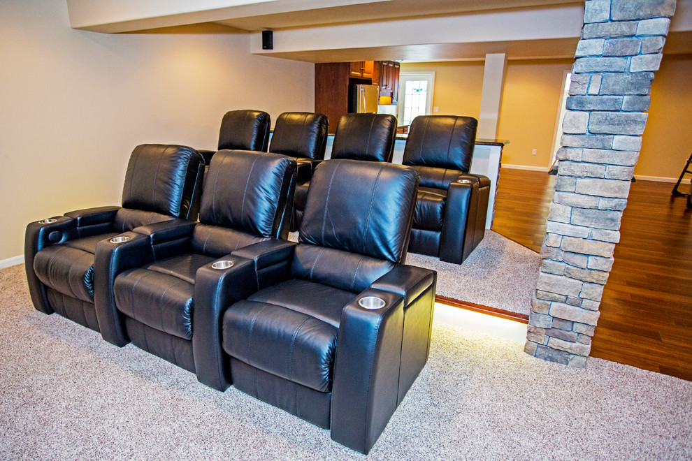Photo of a large contemporary home cinema in DC Metro with beige walls and vinyl flooring.
