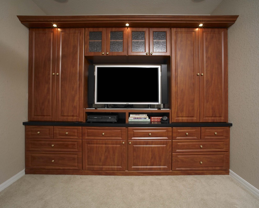 Mid-sized trendy enclosed carpeted home theater photo in Tampa with a media wall and beige walls