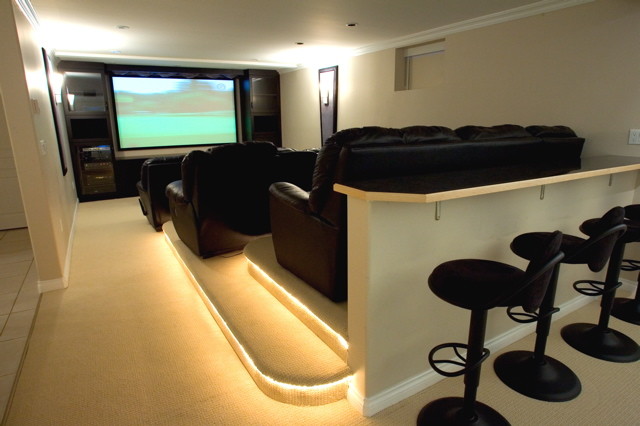 Example of an eclectic home theater design in Vancouver