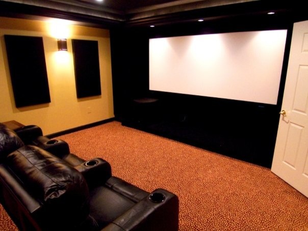 Medium sized eclectic enclosed home cinema in Baltimore with yellow walls, carpet and a projector screen.