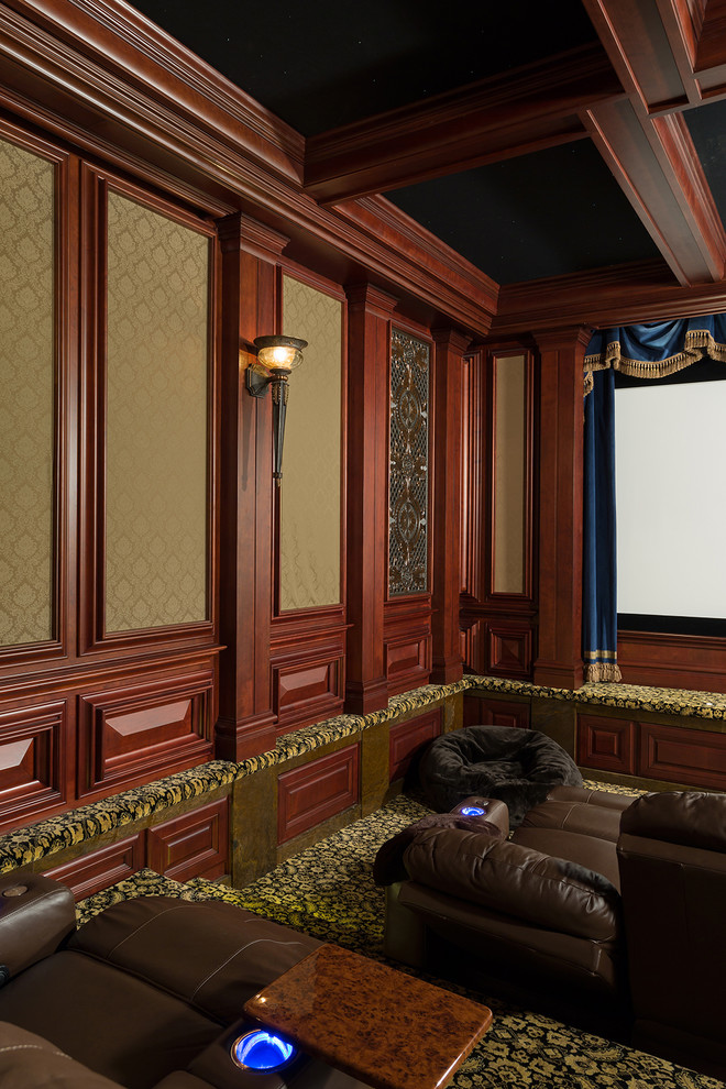 Huge elegant enclosed carpeted and black floor home theater photo in Raleigh with brown walls and a projector screen