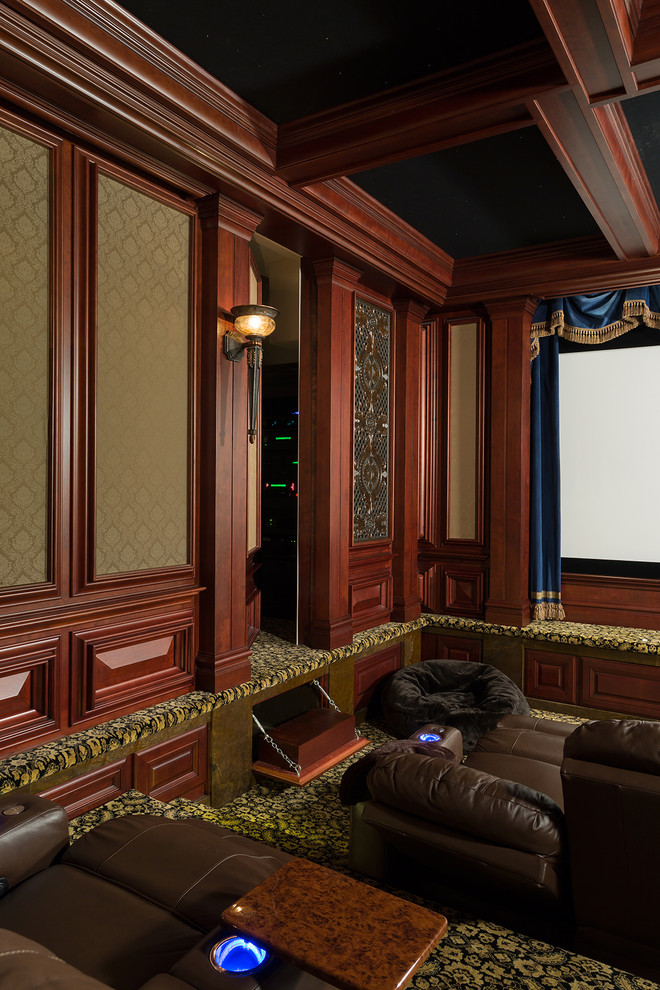 Inspiration for a large timeless enclosed carpeted and yellow floor home theater remodel in Raleigh with brown walls and a projector screen
