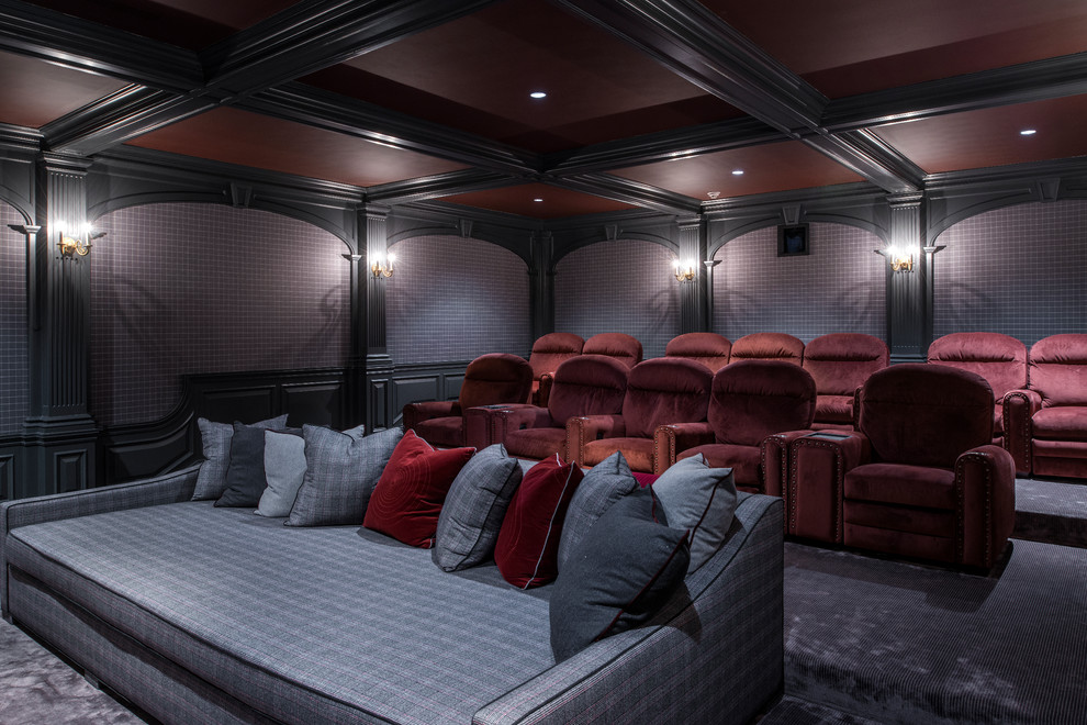 Inspiration for a large timeless enclosed carpeted home theater remodel in New York with a projector screen