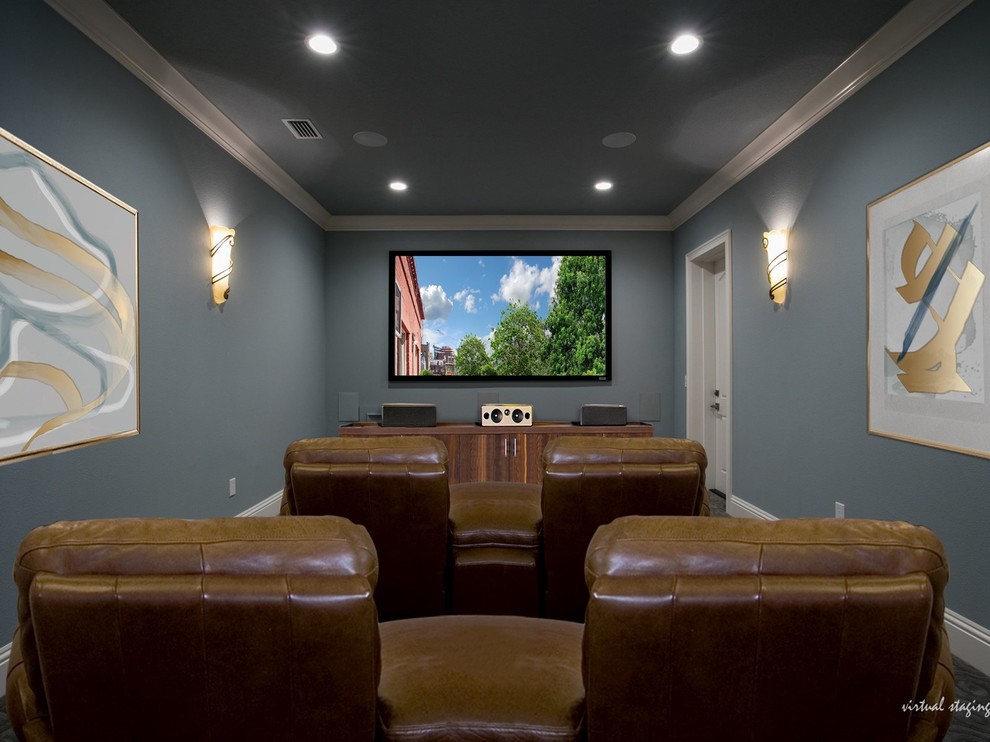 Diseño de cine en casa cerrado tradicional renovado grande con paredes azules y televisor colgado en la pared