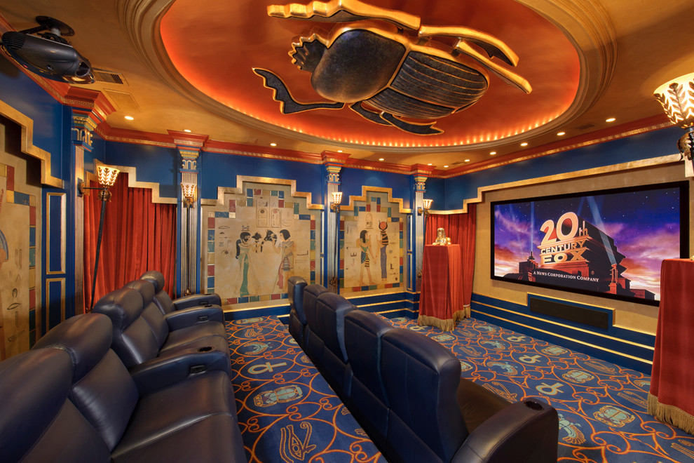 Inspiration for a mediterranean home theater remodel in Houston with a projector screen