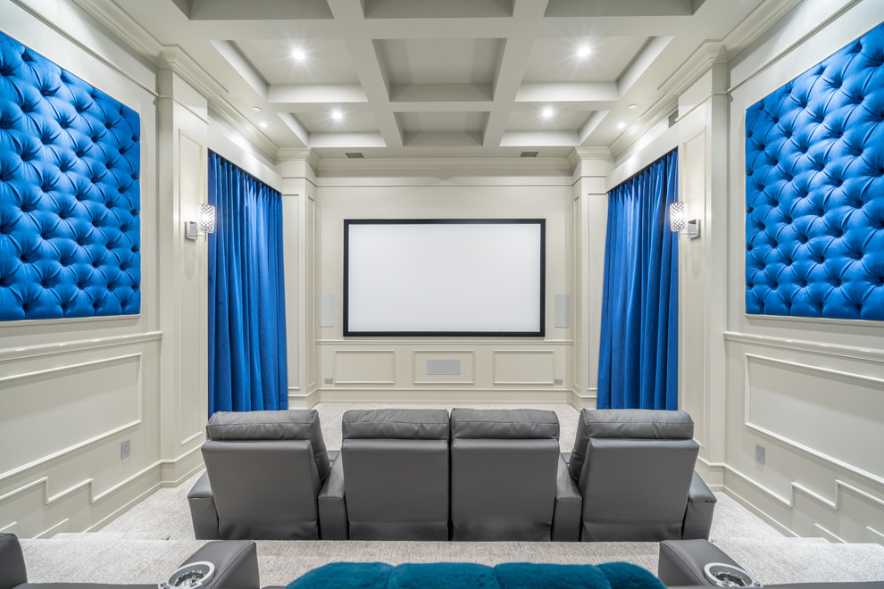 This is an example of a mediterranean home cinema in Phoenix.
