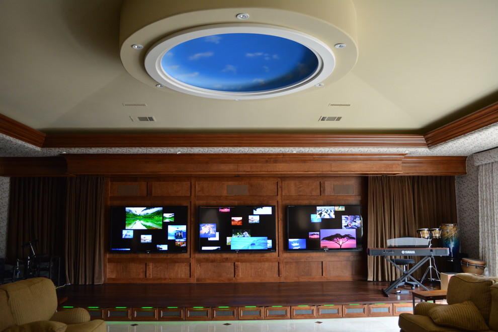 Hidden speakers from Definitive Technology. Control by RTI. Contemporary Home Theater San