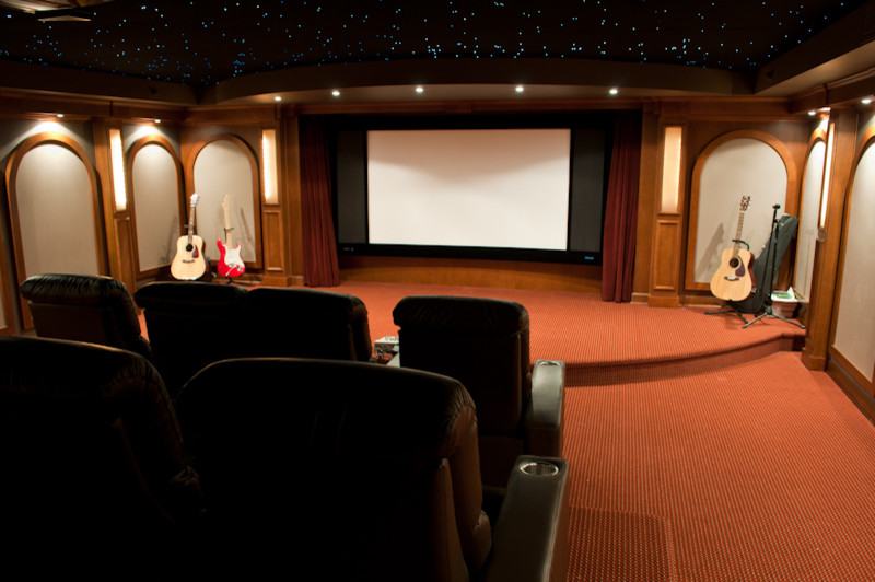 Elegant home theater photo in Vancouver
